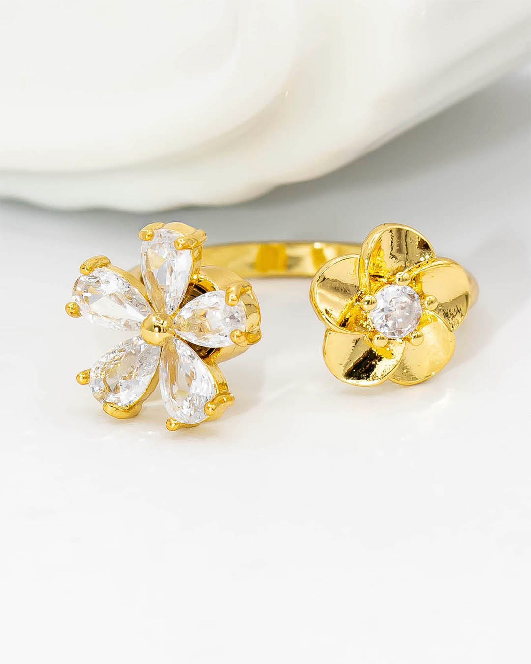 Anillo giratorio doble flor