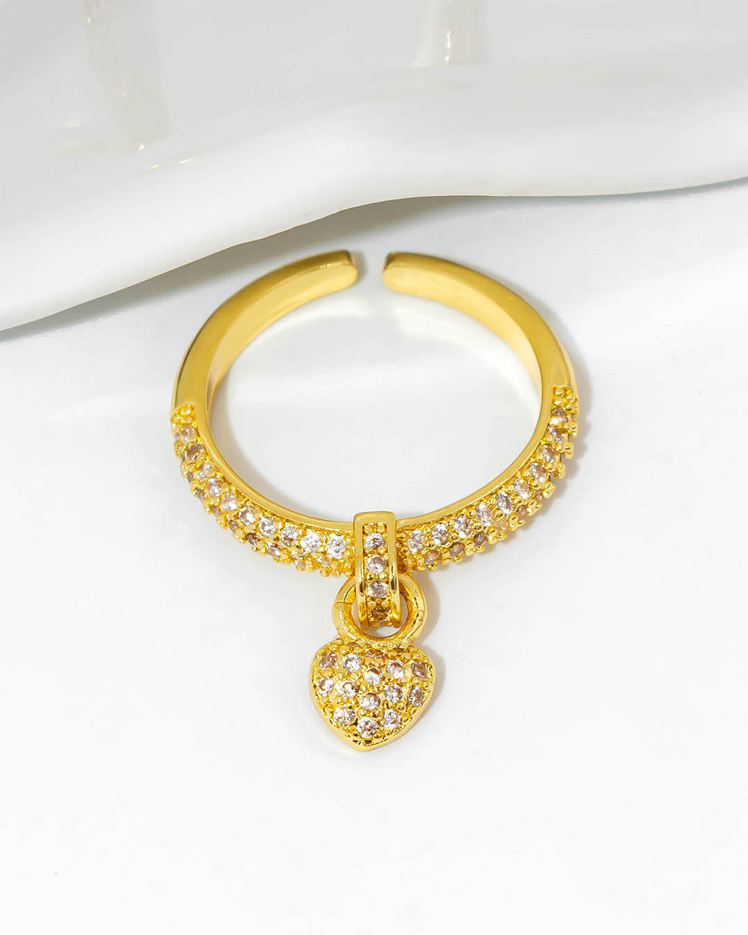 Anillo corazón colgante