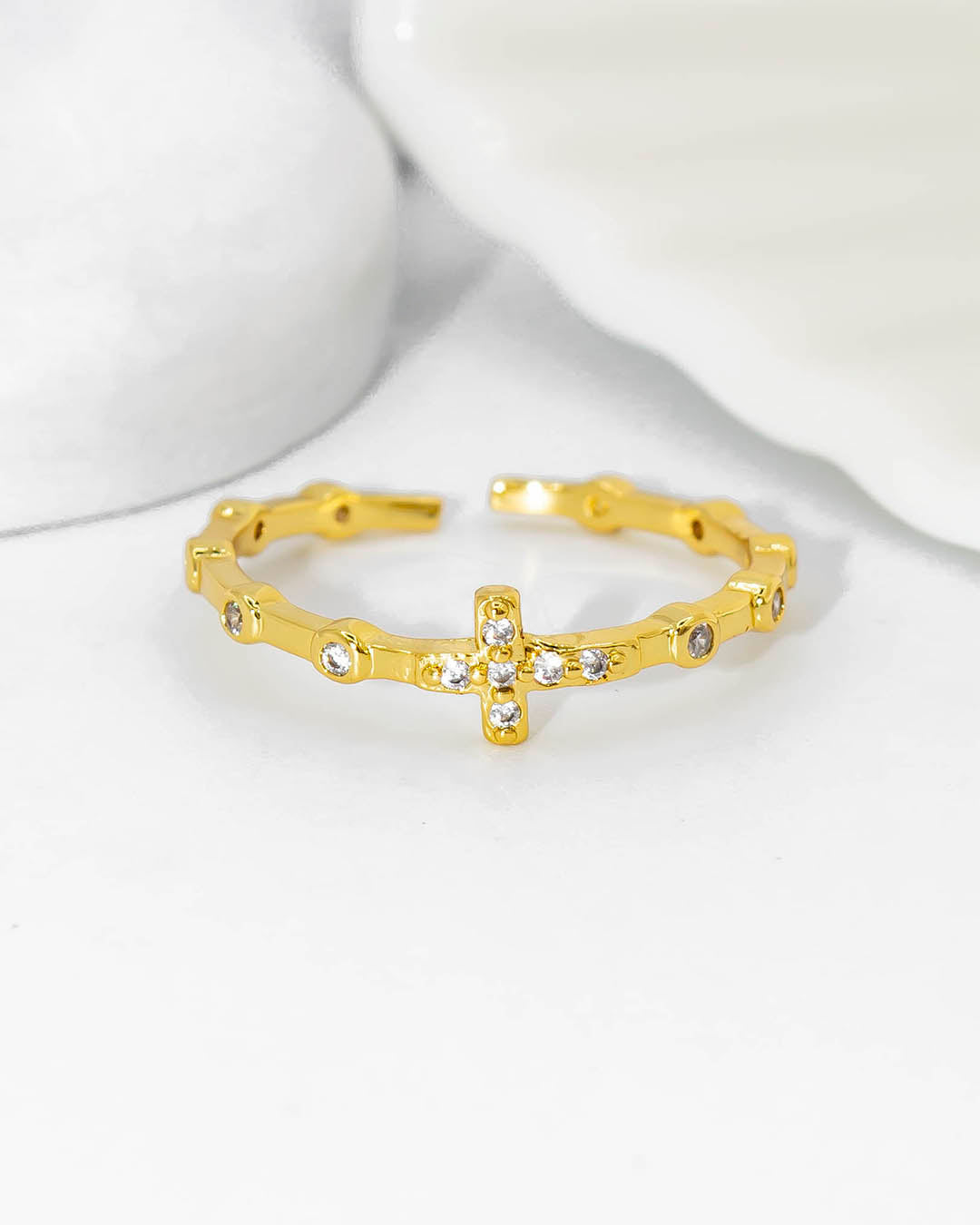 Anillo cruz y puntos