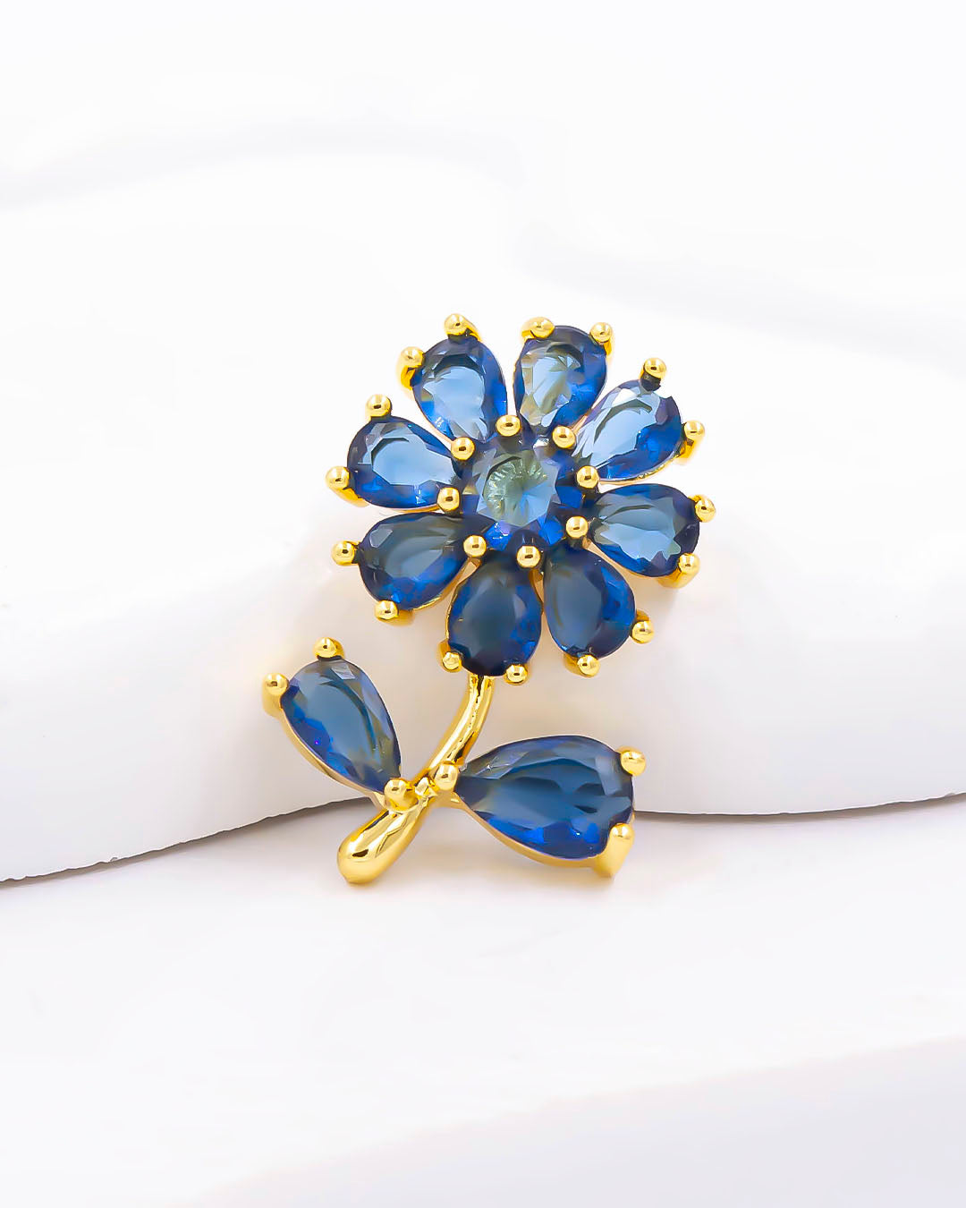 Dije girasol azul de pasador