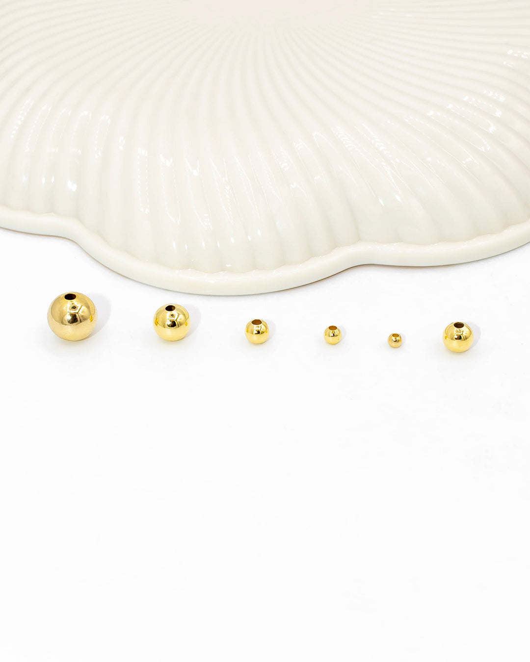 Oro laminado balín liso