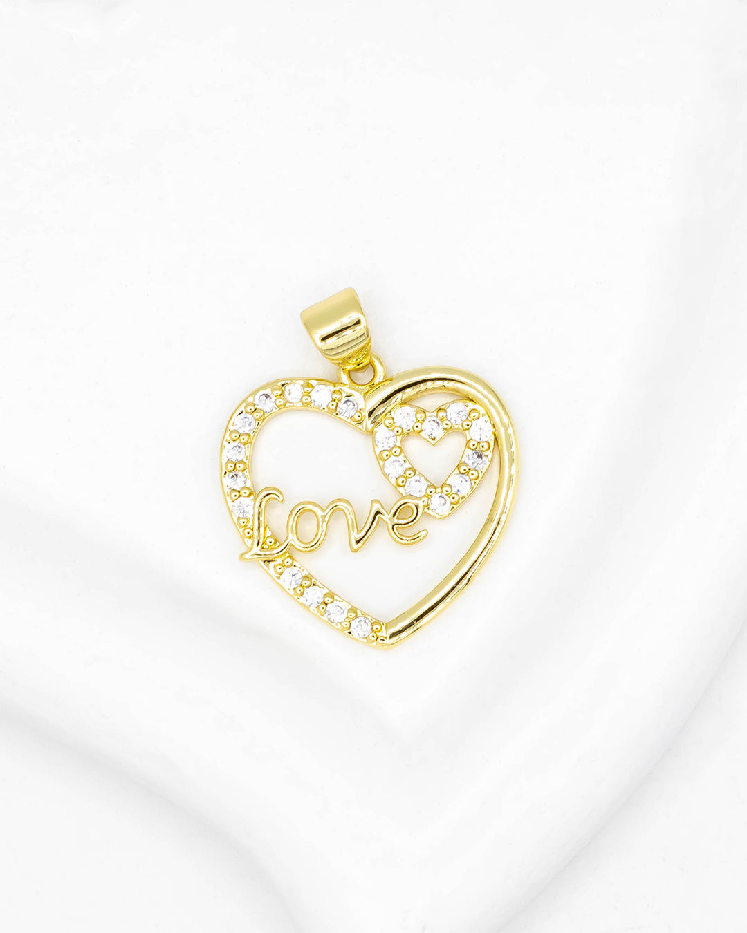 Dije corazón love circon