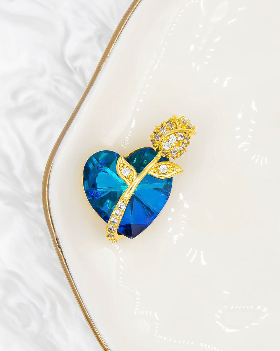 Dije corazón swarovski con flor