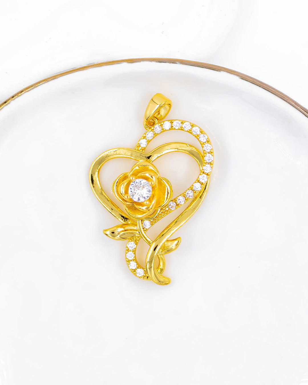 Dije giratorio corazón