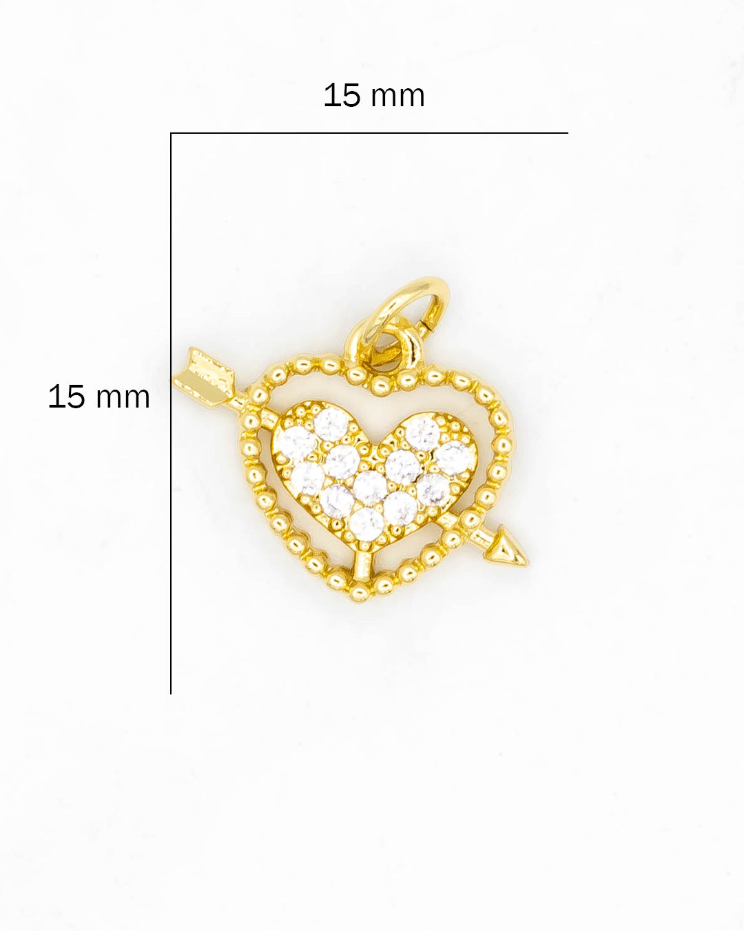 Dije corazón flechado