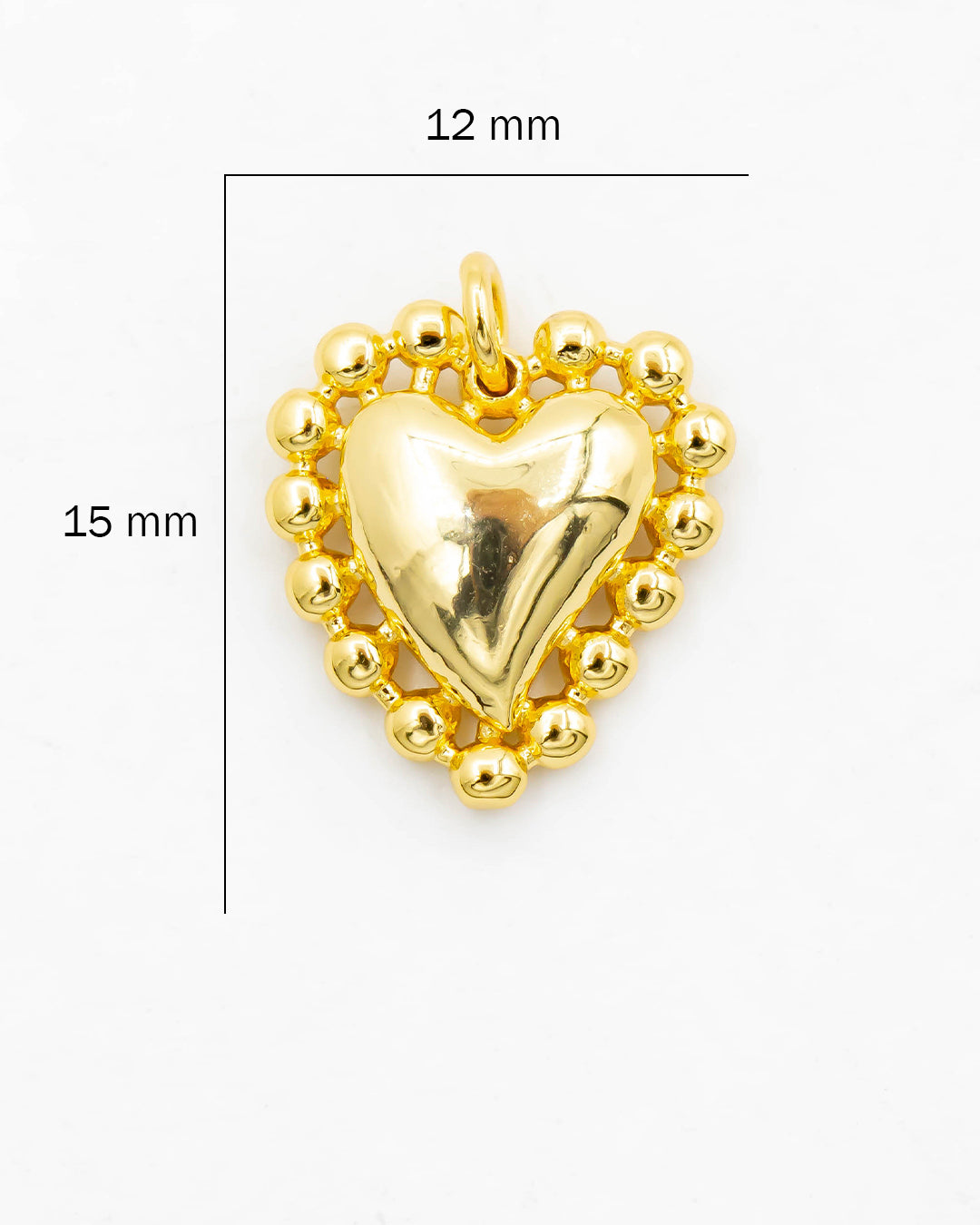 Dije corazón borde balines