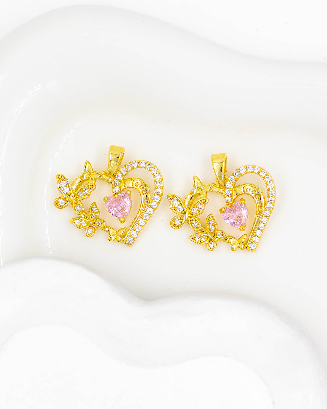 Dije corazón con mariposas