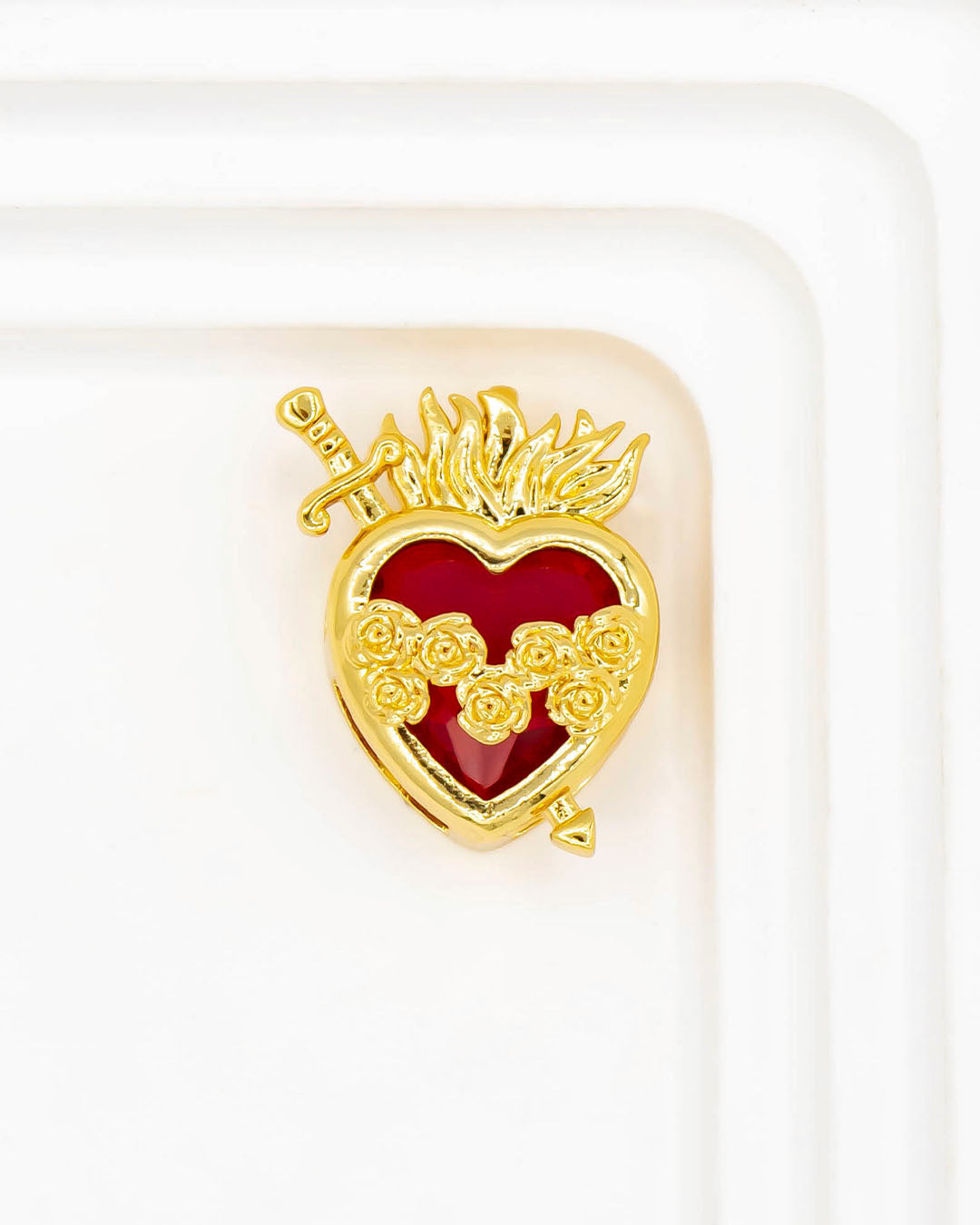 Dije sagrado corazón espada