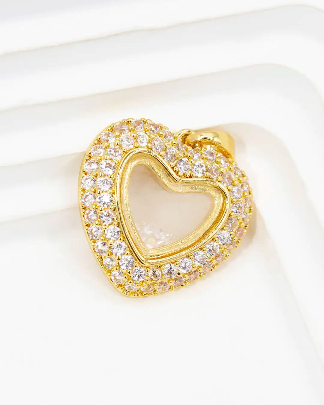 Dije corazón piedras