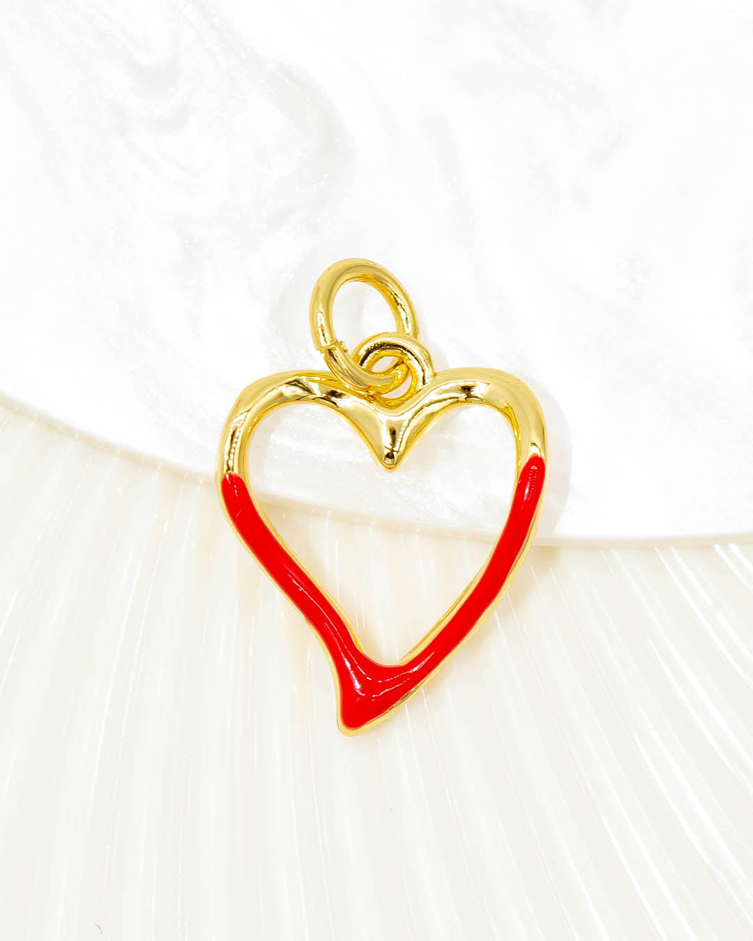 Dije corazón silueta rojo