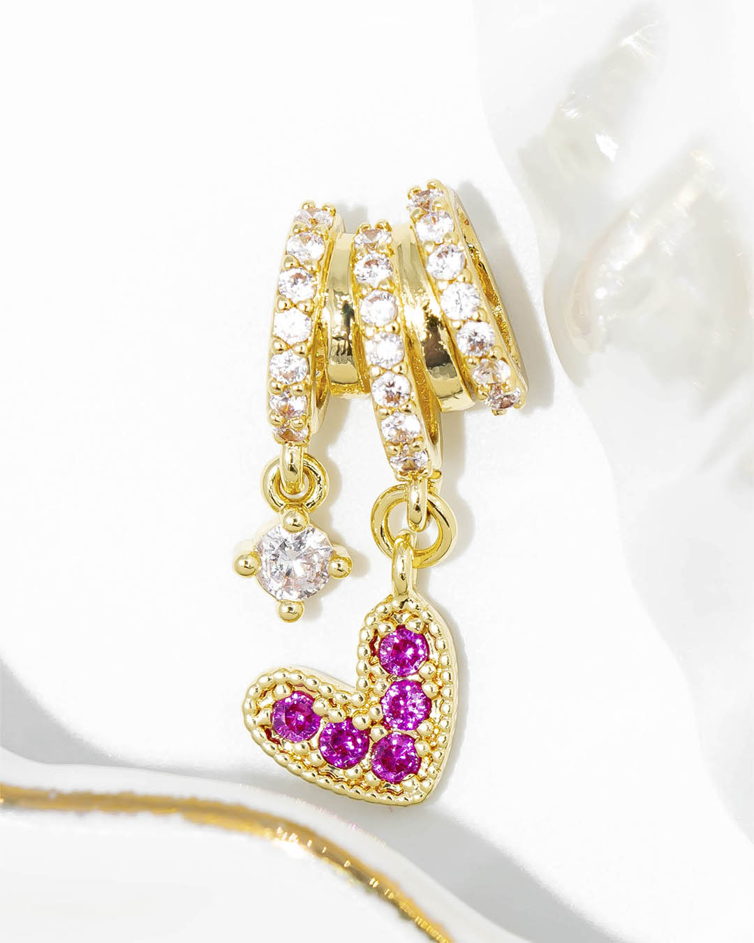 Dije corazón fucsia