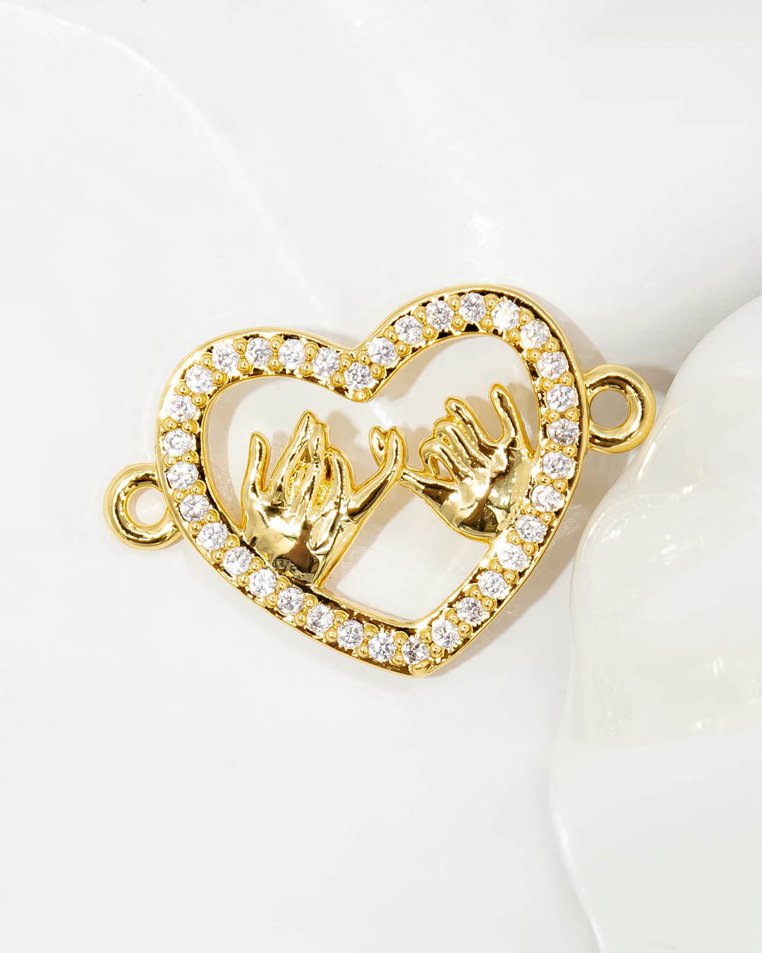 Dije pulsera corazón manos