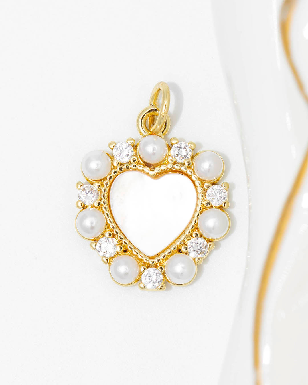 Dije corazón perla nácar