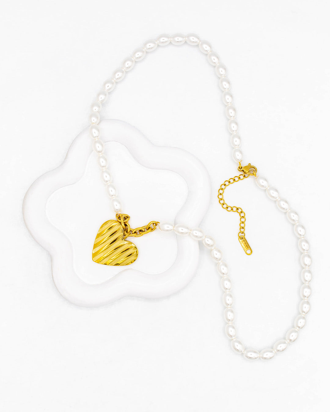 Cadena de perlas con corazón