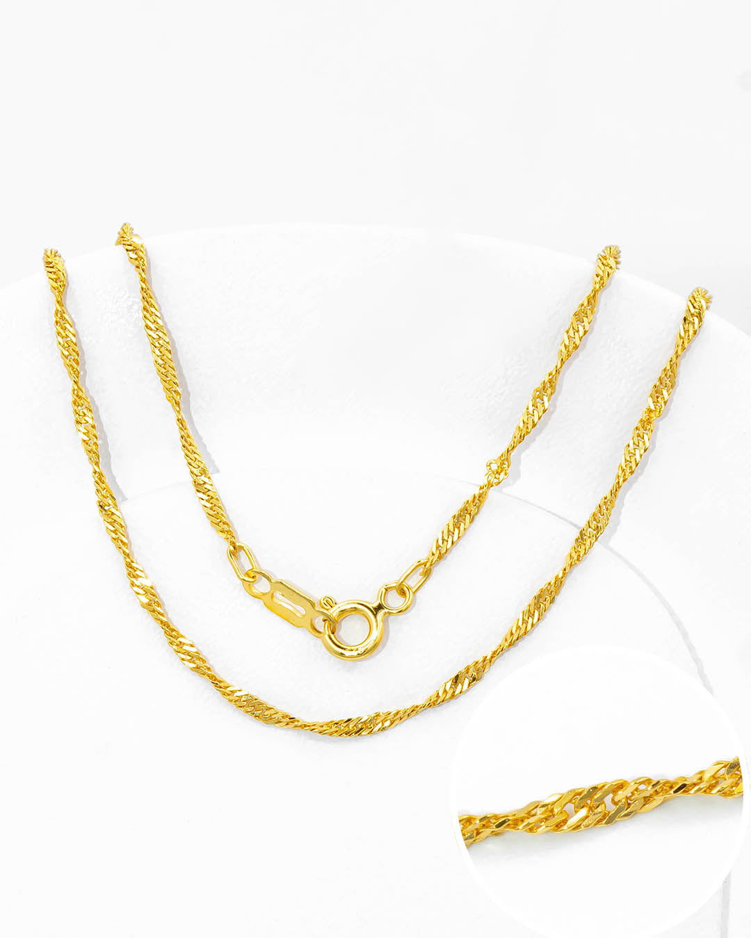 Oro laminado cadena singapur