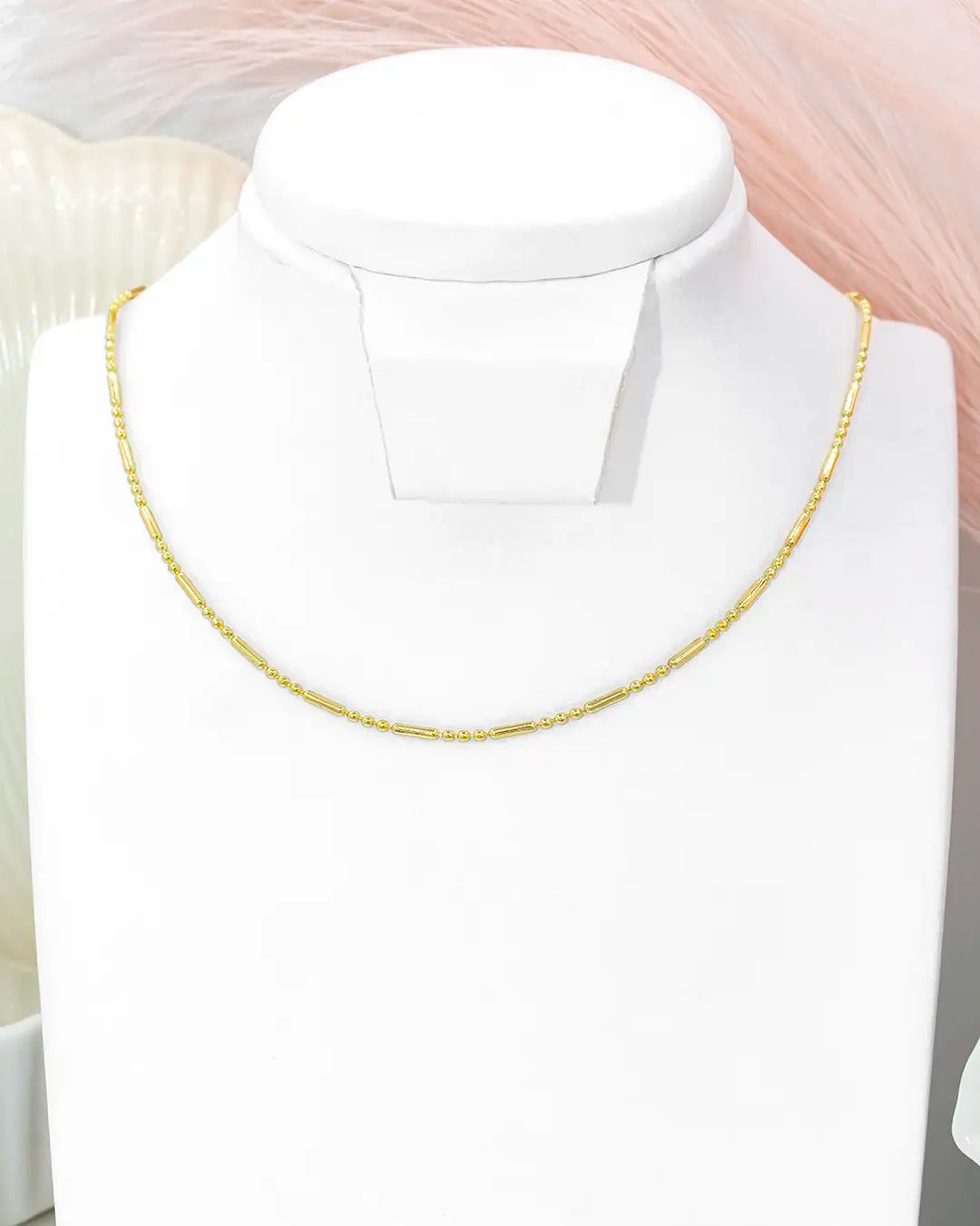 Cadena triple bolita y palito