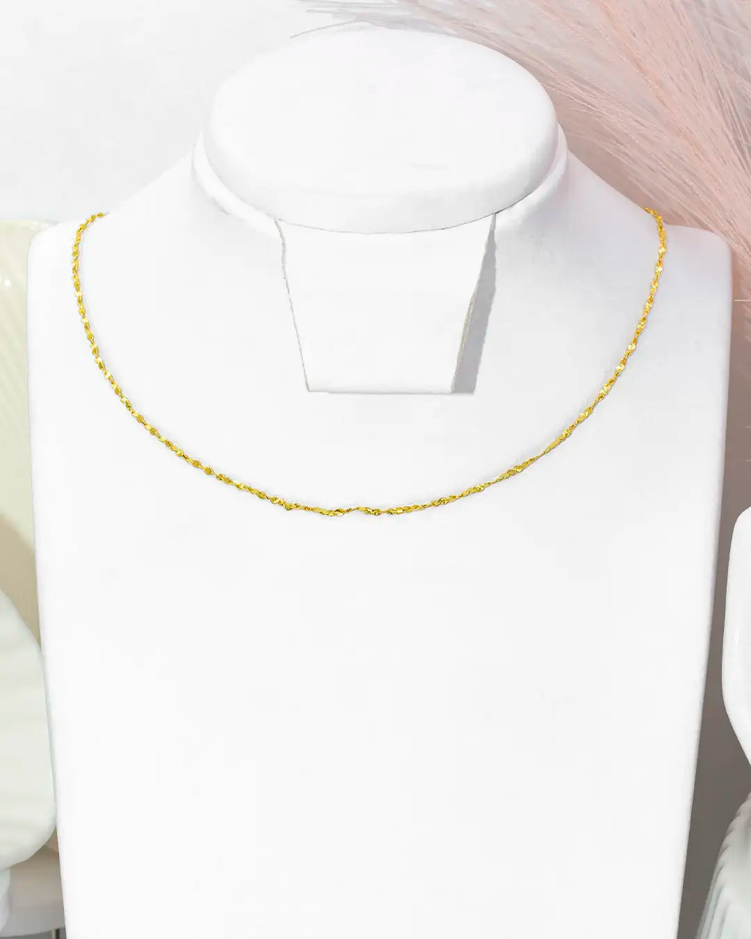 Cadena delgada aguja