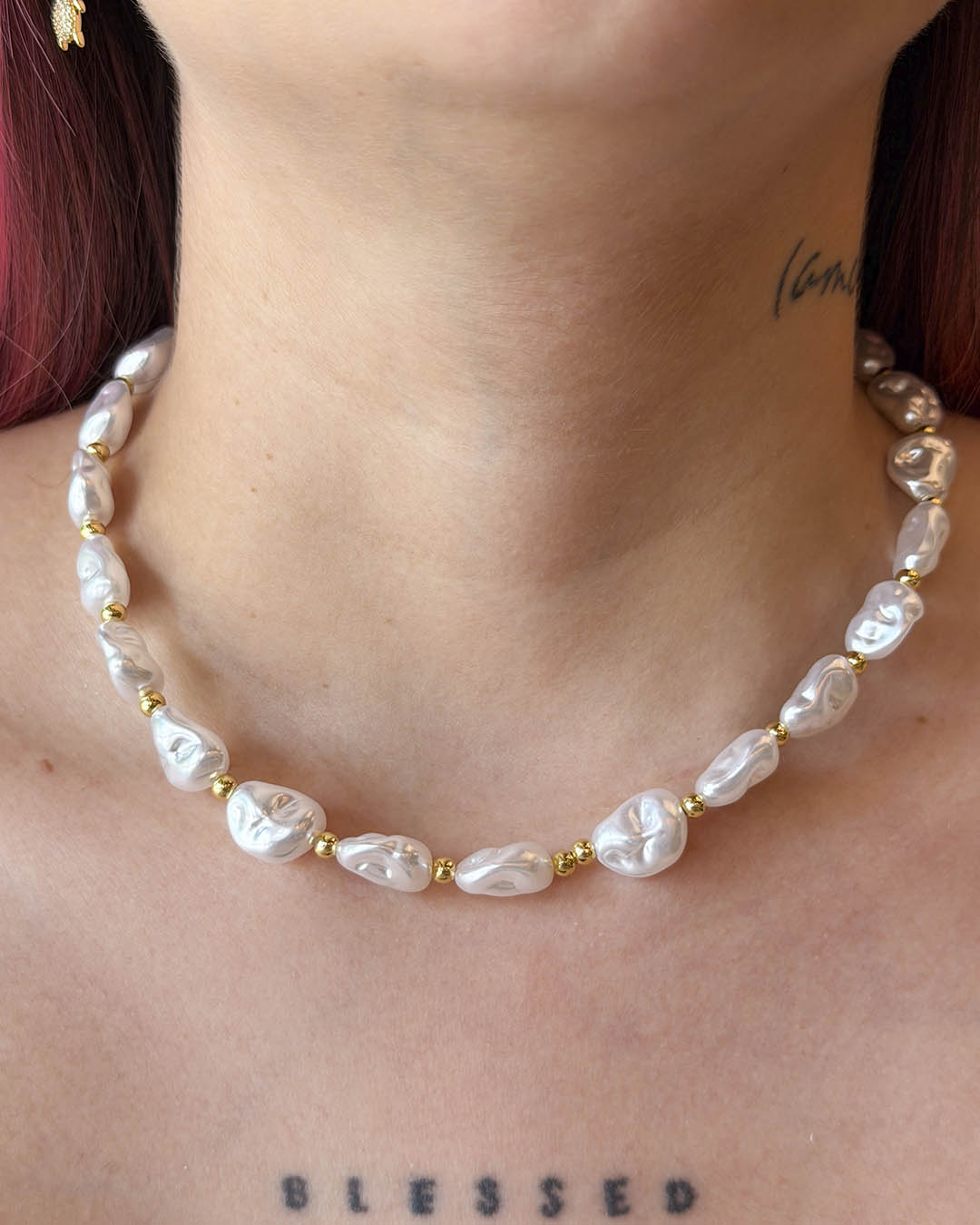 Cadena perla tallada