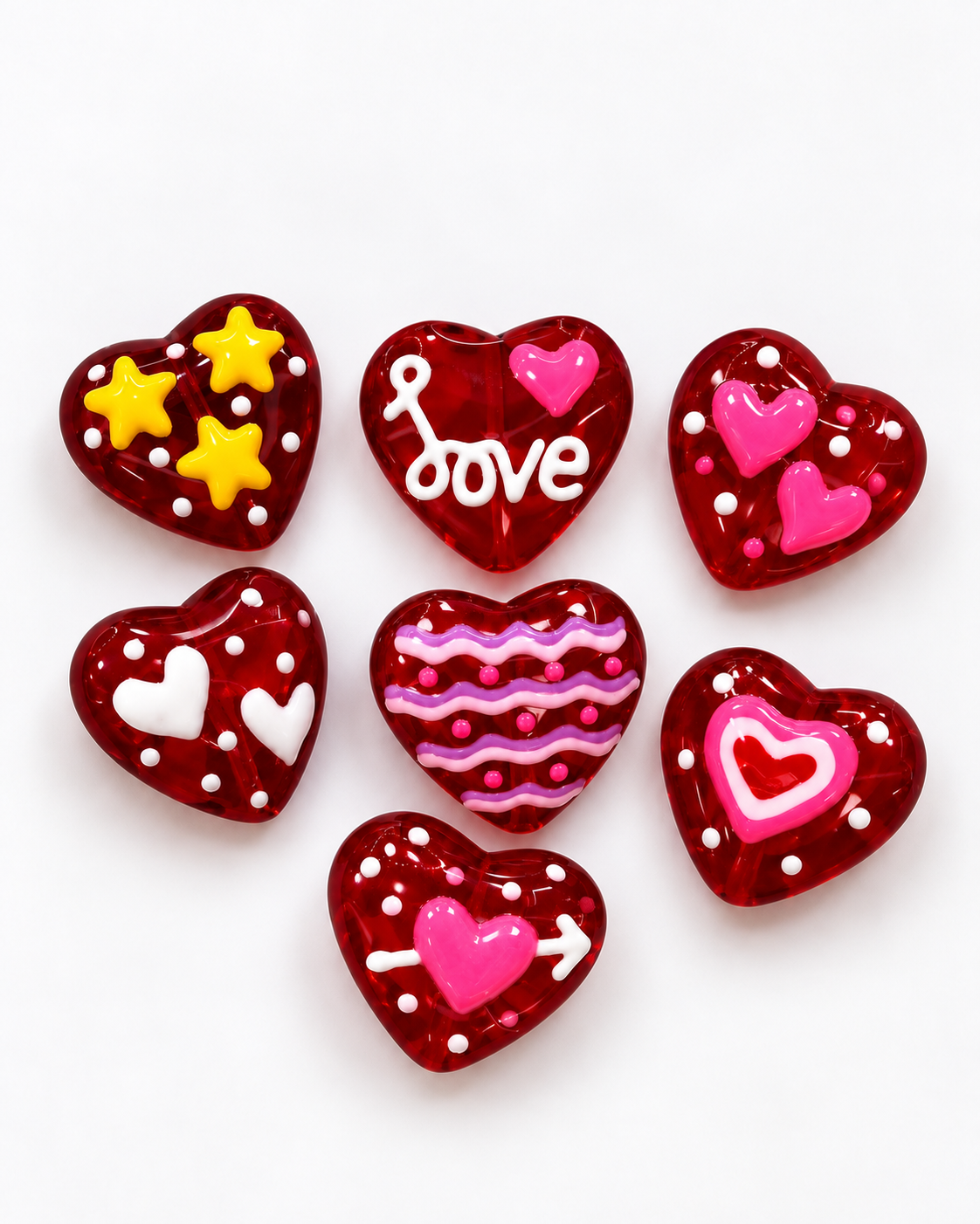 Dije corazones rojos