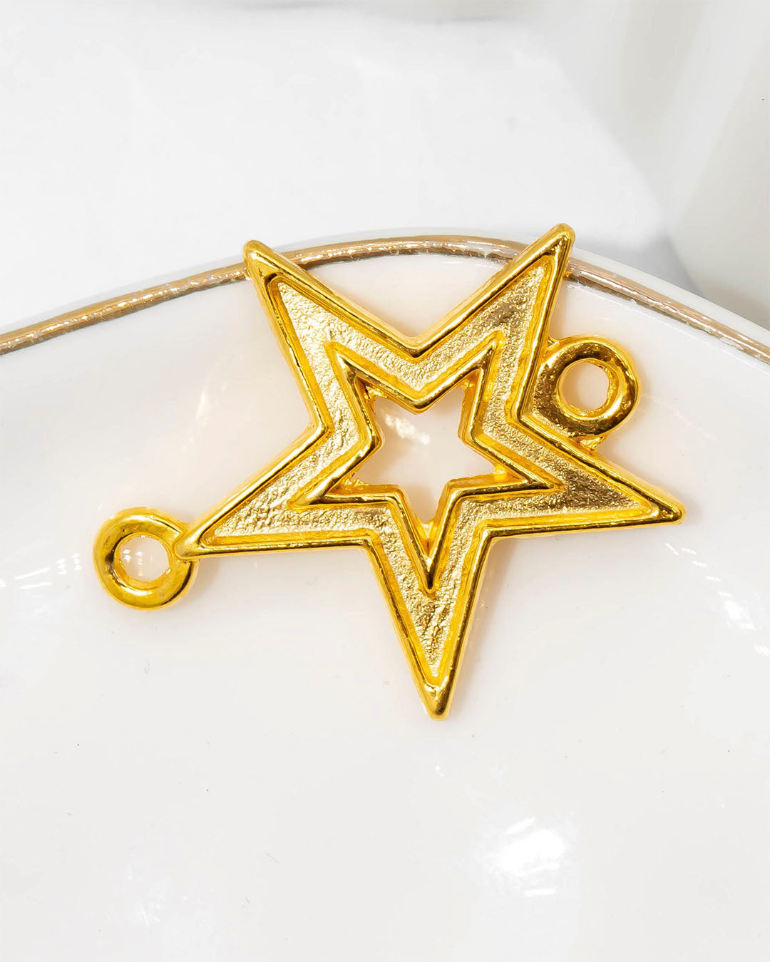Dije pulsera estrella silueta