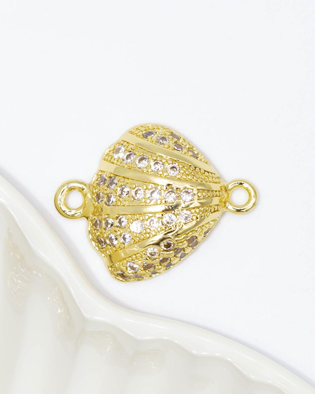 Dije pulsera concha