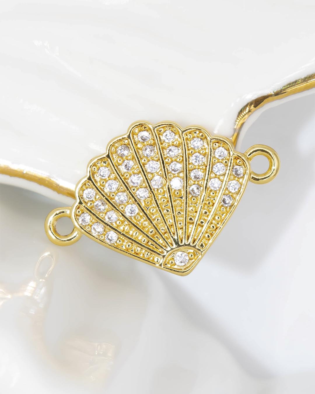 Dije pulsera concha