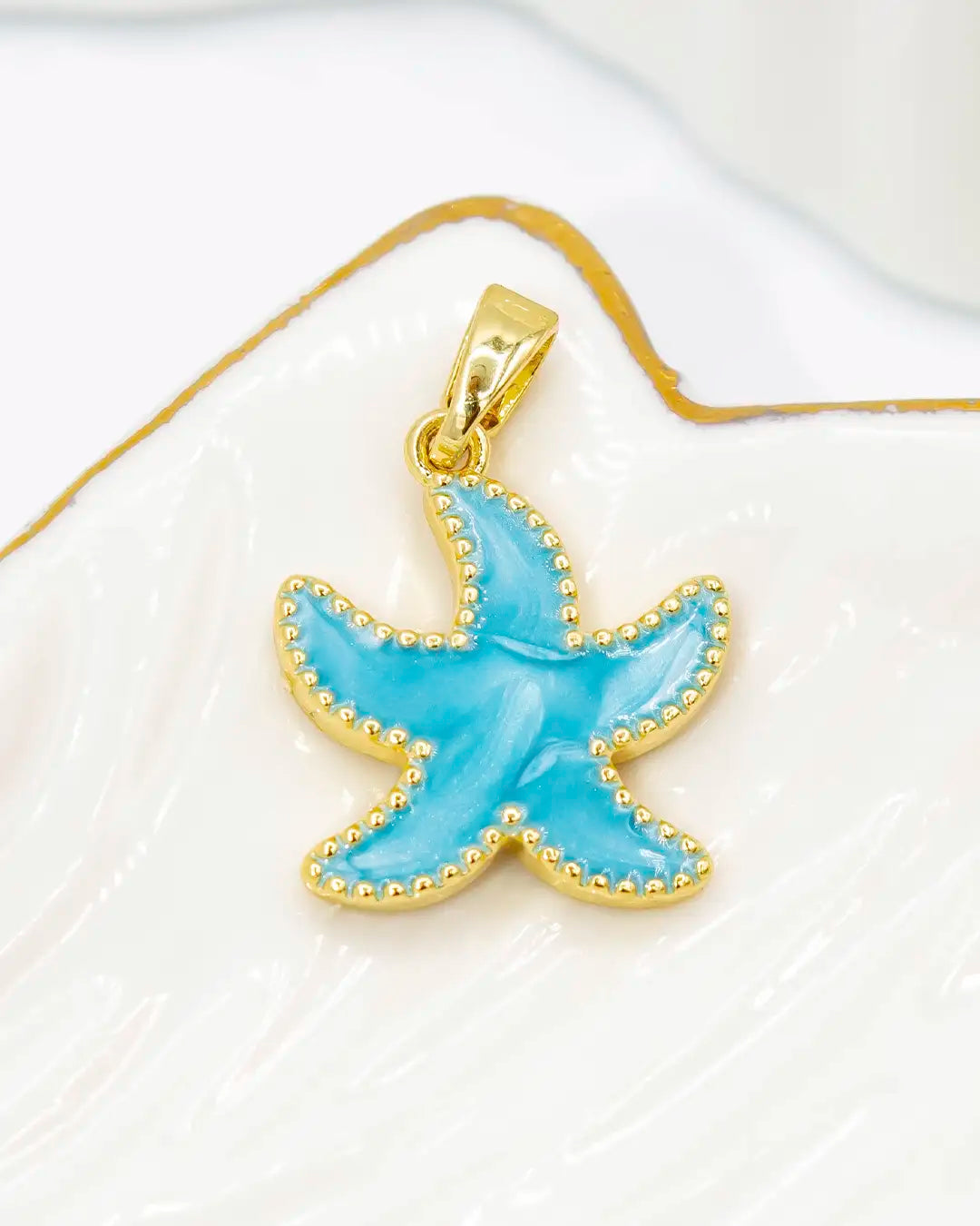 Dije estrella de mar azul