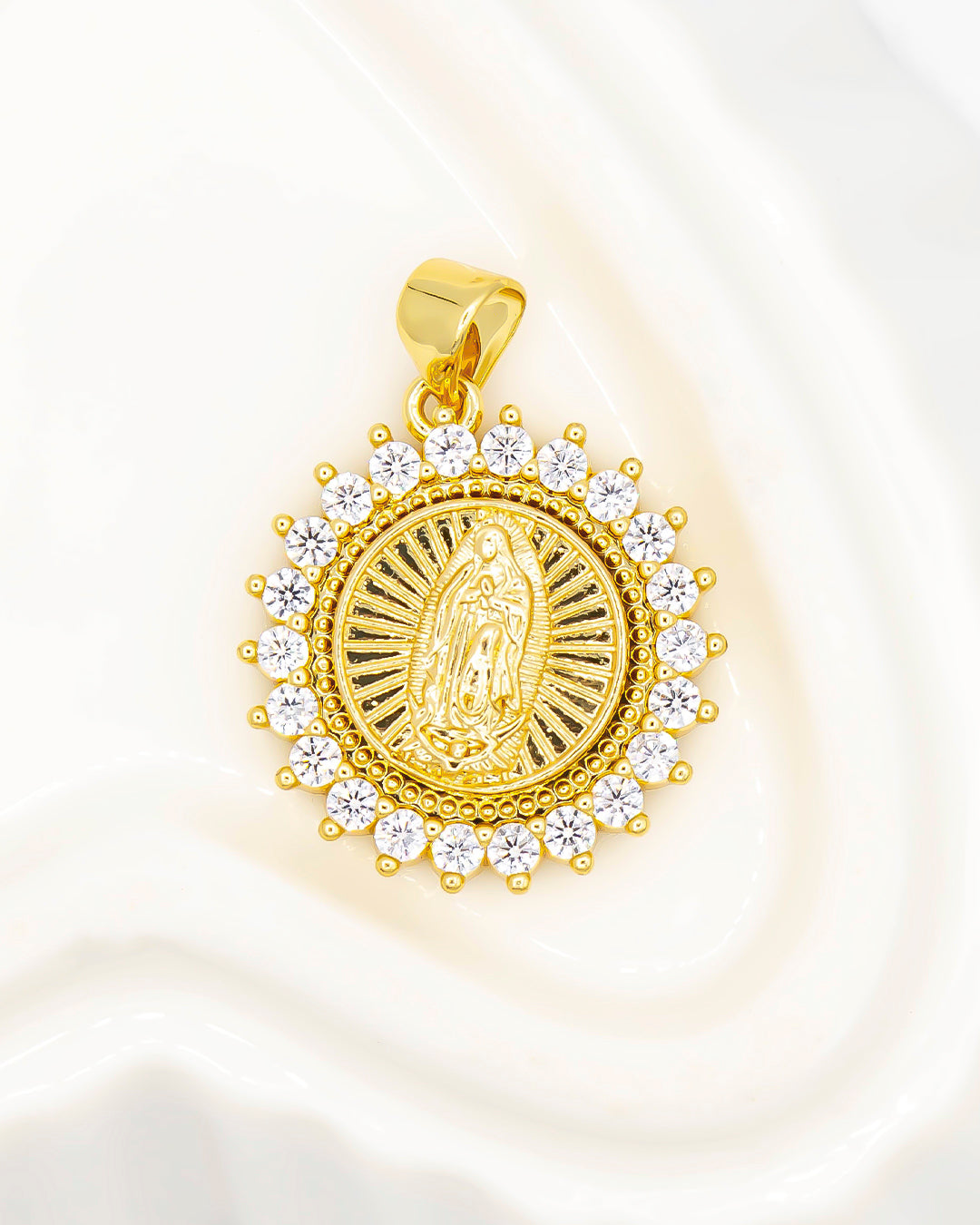 Dije giratorio virgen de Guadalupe