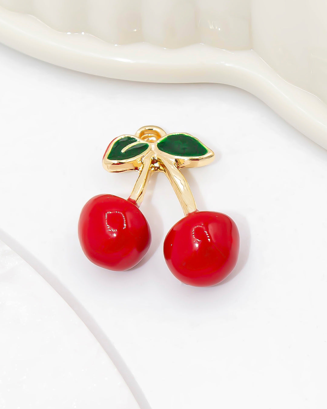 Dije cherry pequeño