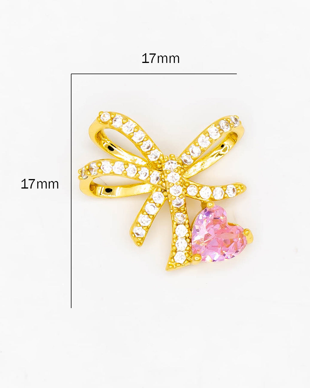 Dije moño con corazón