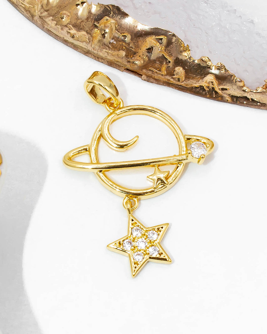 Dije planeta, luna y estrella