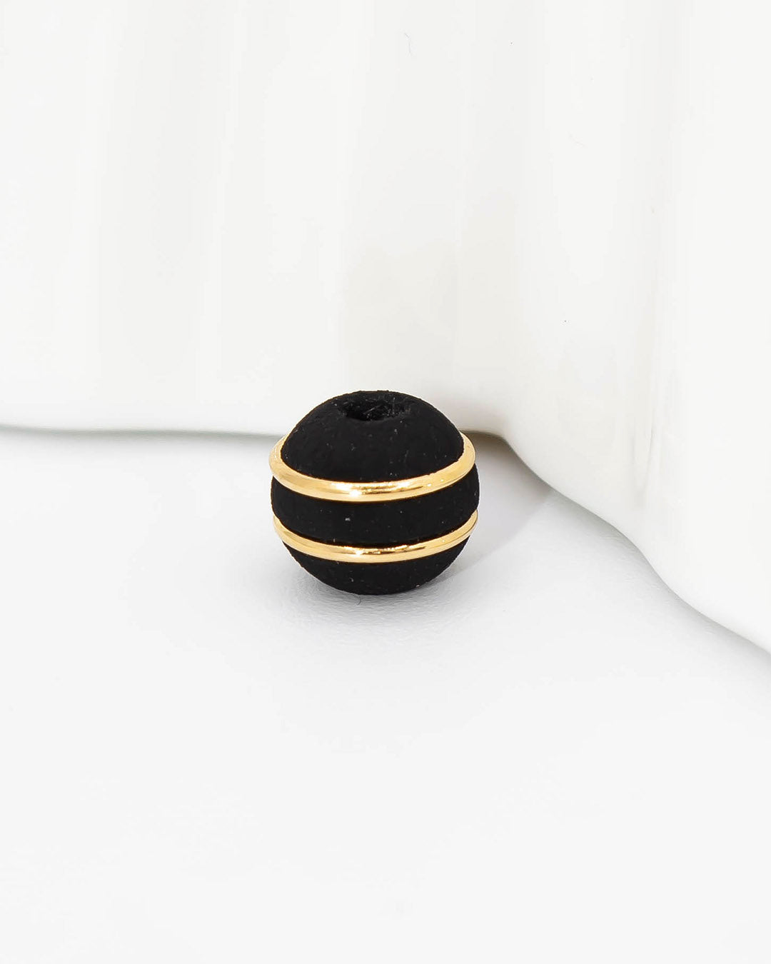 Oro laminado bola neopreno dos argollas