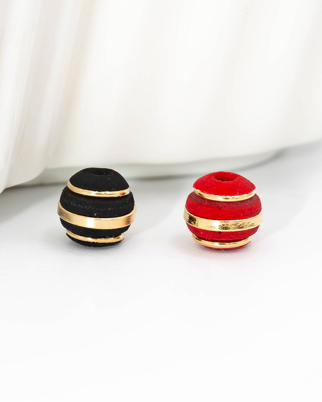 Oro laminado bola neopreno tres argollas