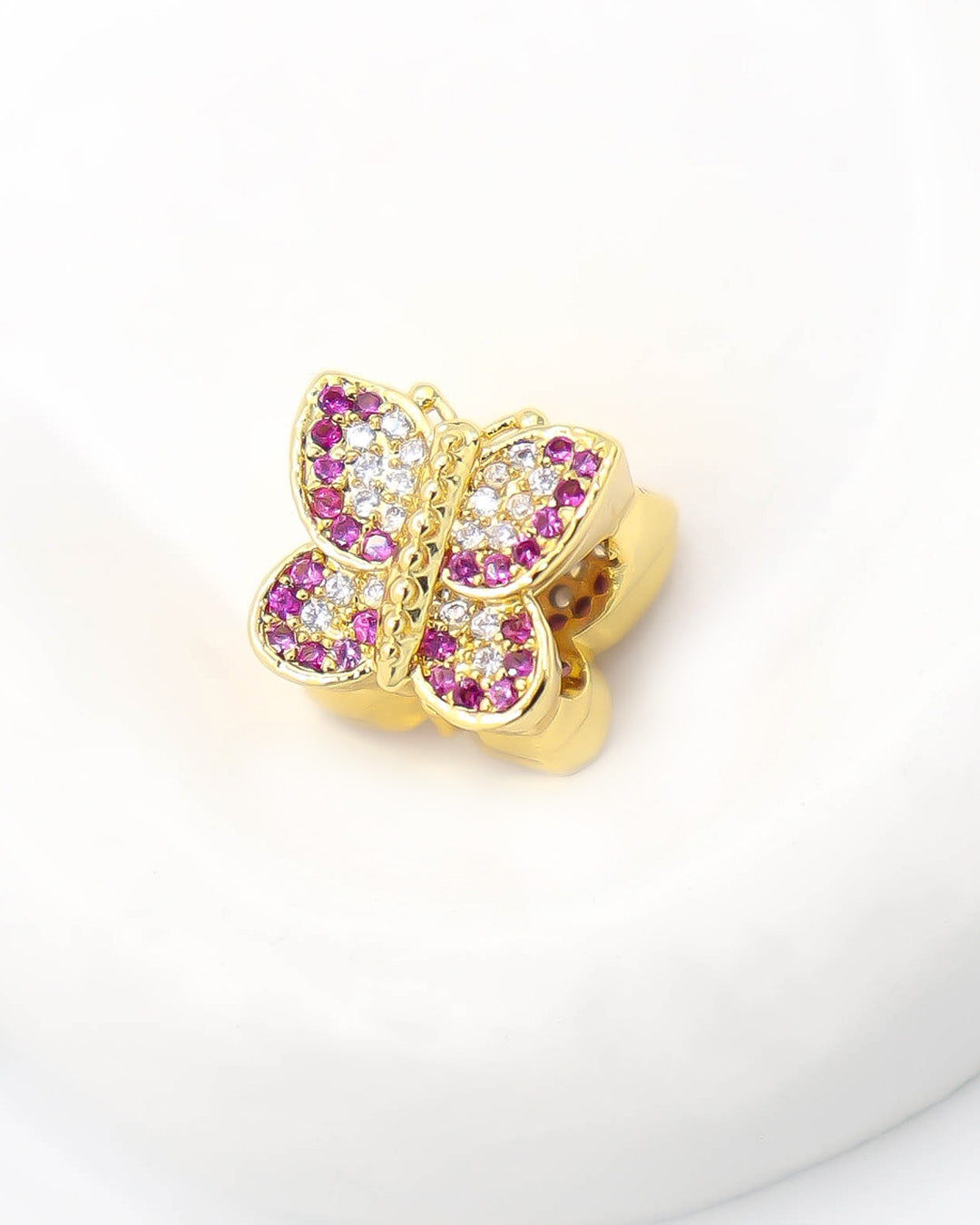 Dije pasador mariposa