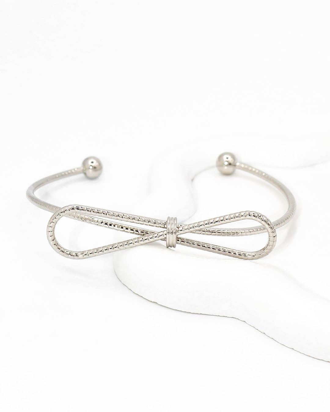 Pulsera moño plateado