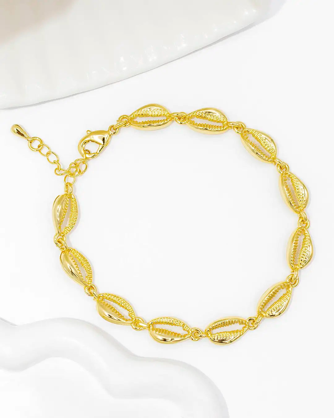 Pulsera concha seguida