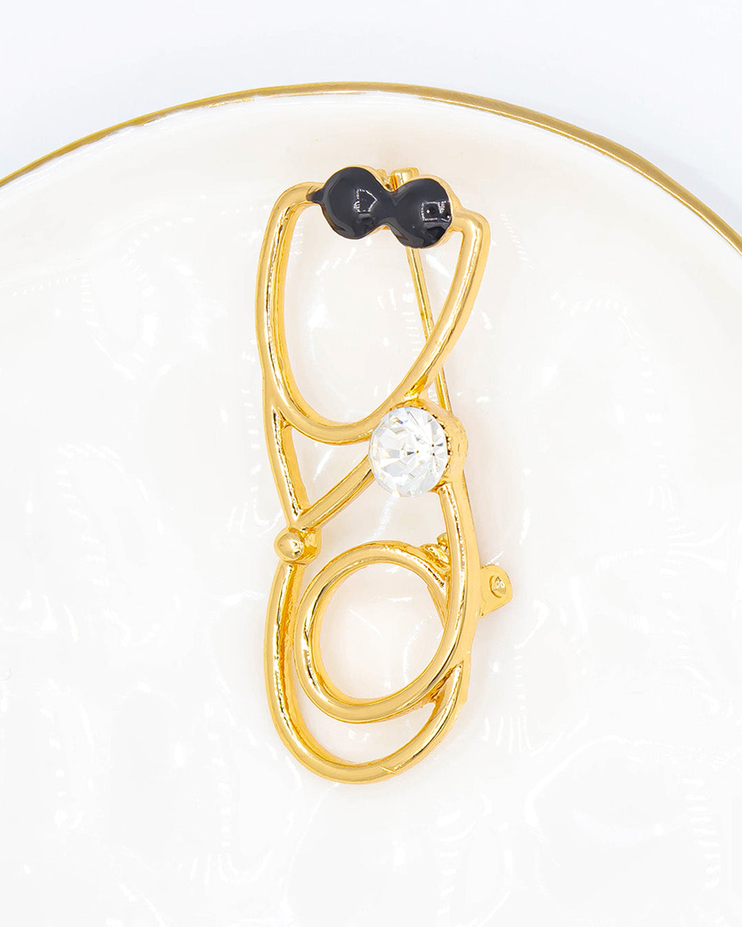 Prendedor estetoscopio