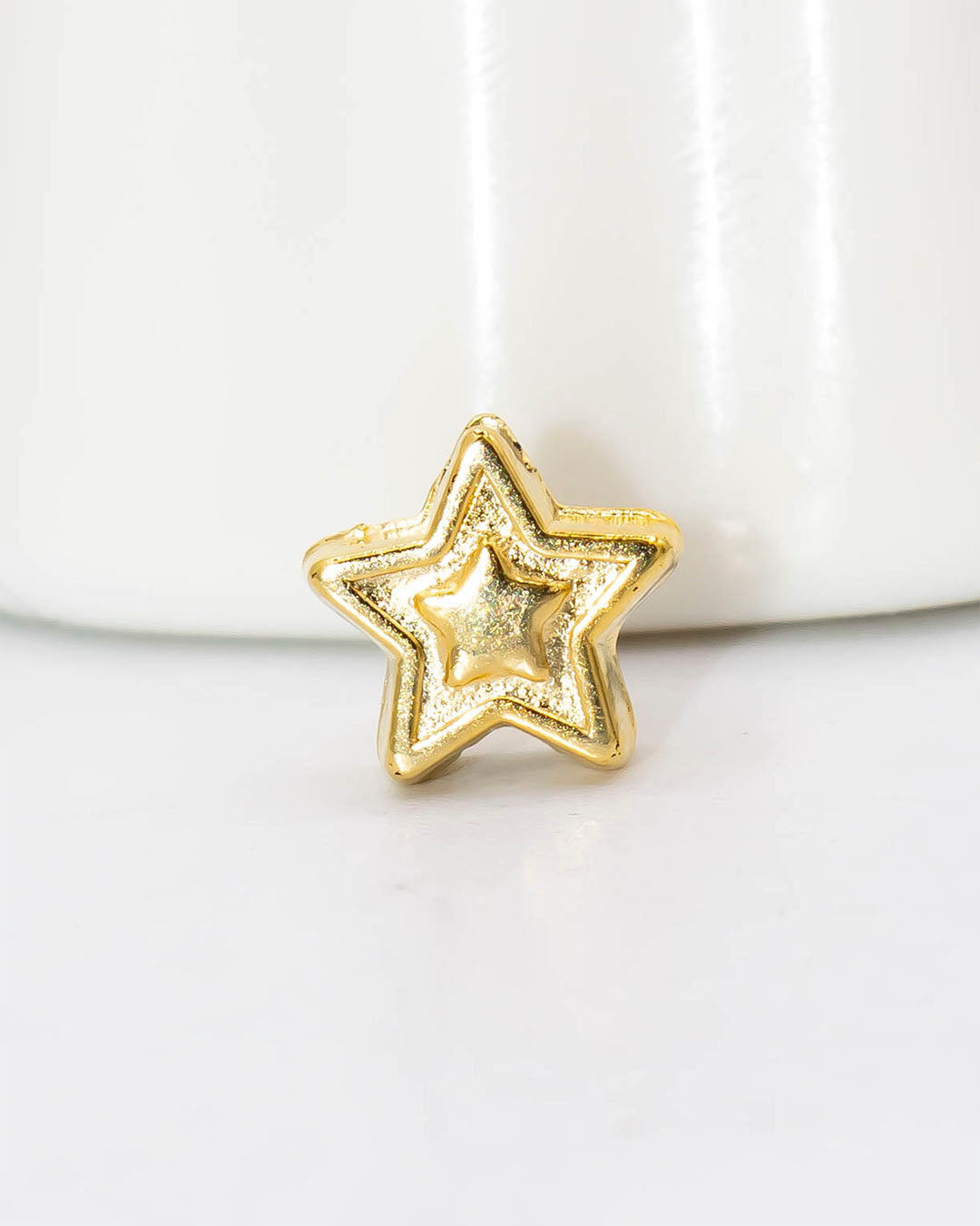 Dije estrella pasador