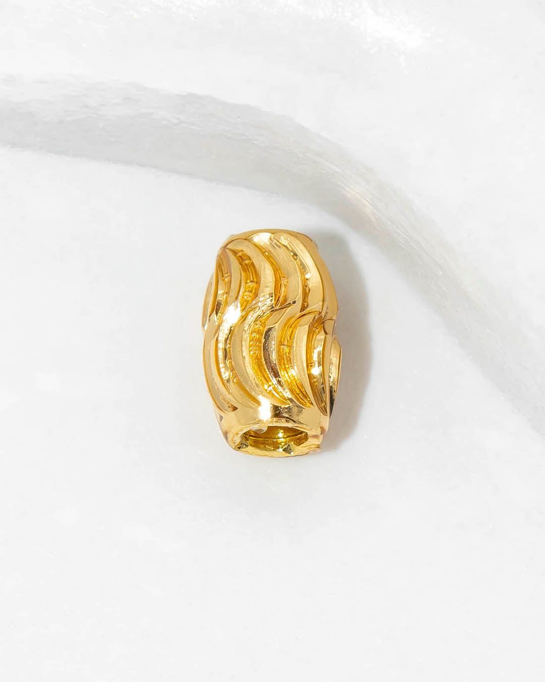 Oro laminado separador barril rayado