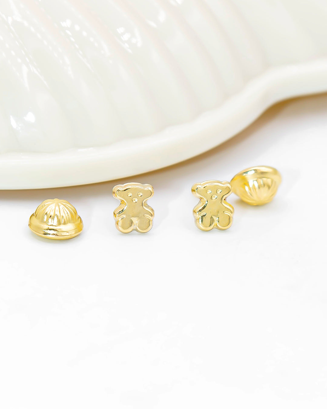 Oro laminado topo oso