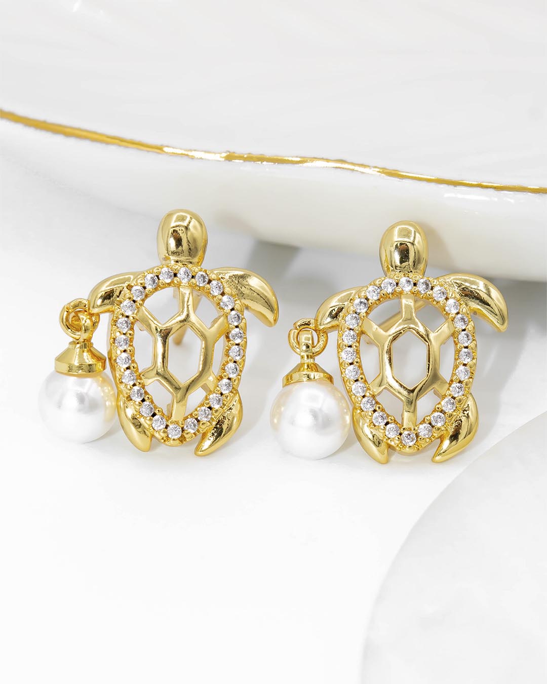 Topo tortuga con perla