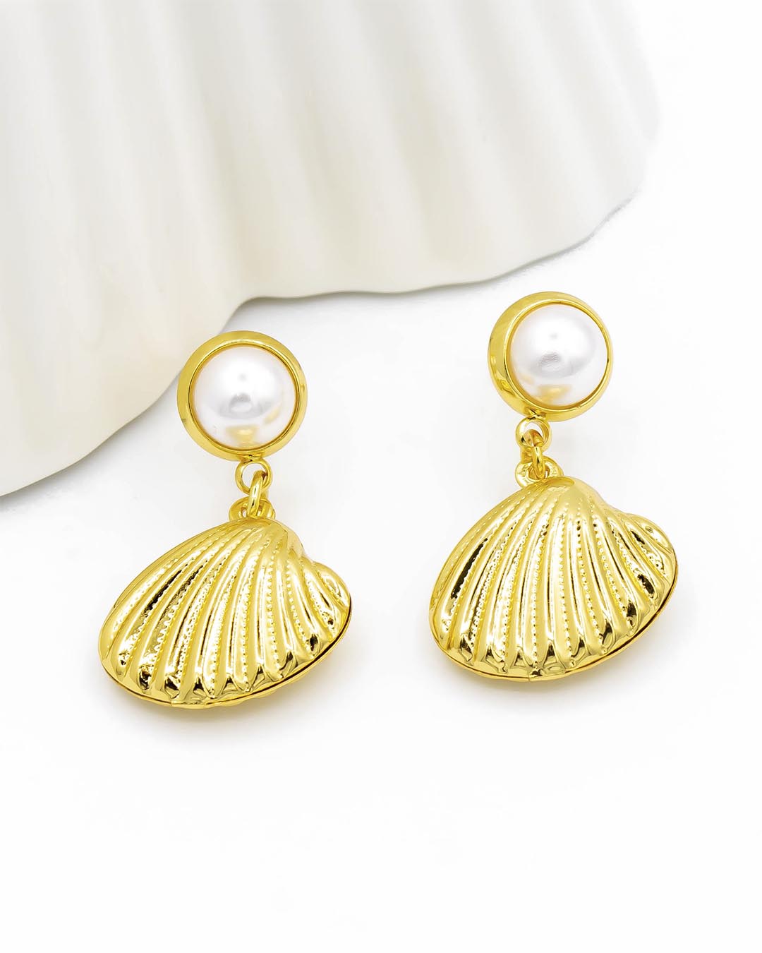 Topo concha con perla