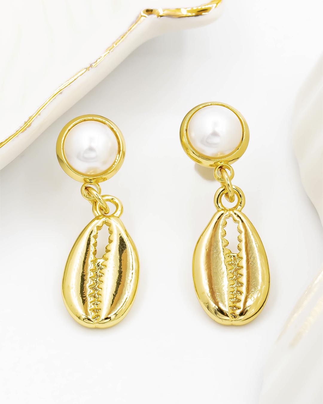 Topo concha con perla