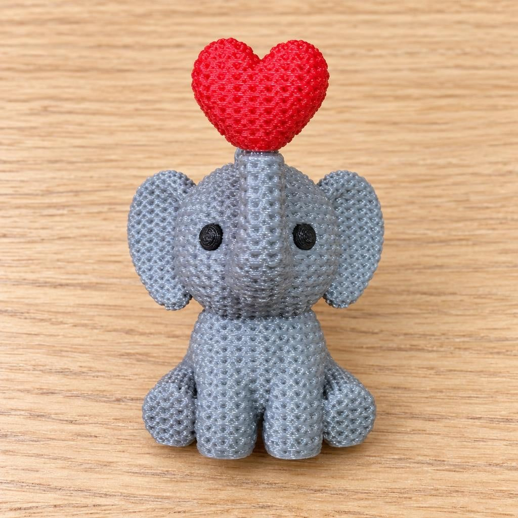 Dije de plástico elefante