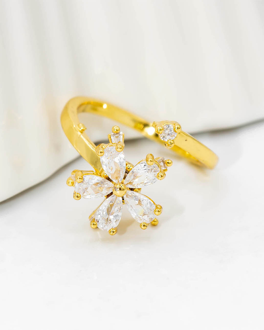 Anillo giratorio flor