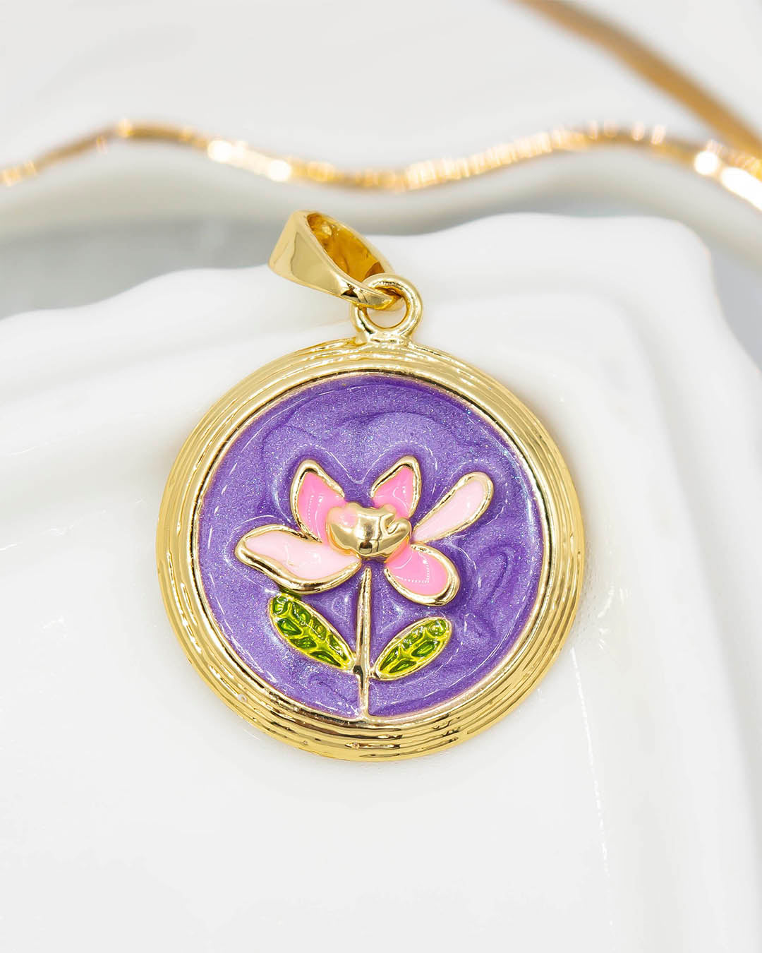 Dije flor morada