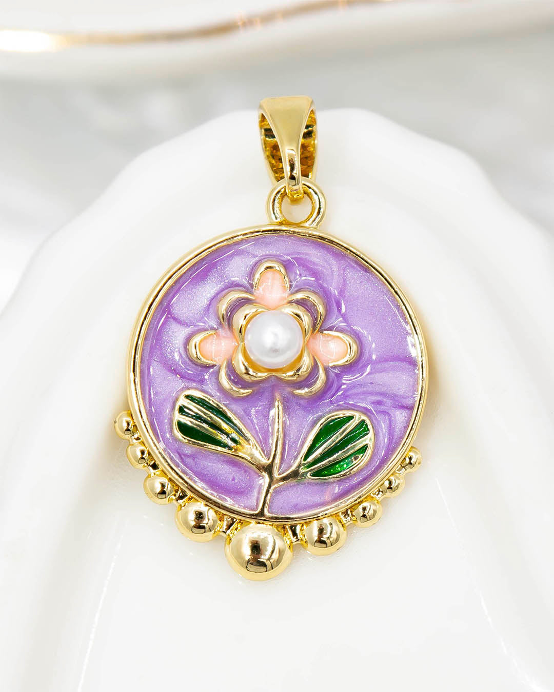 Dije flor morada