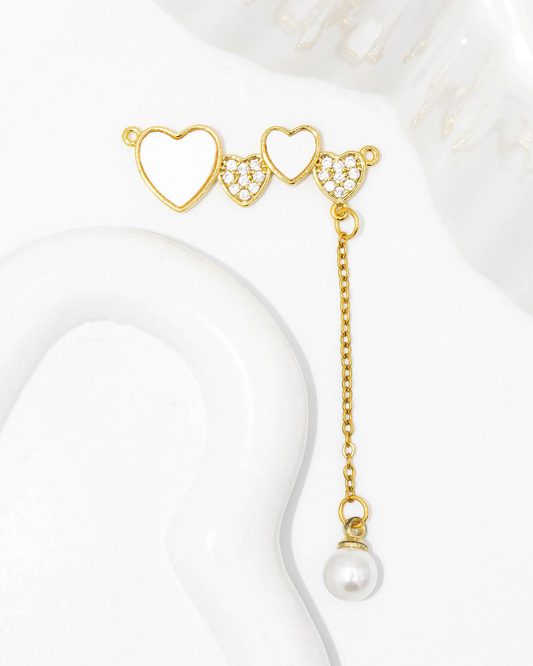 Dije pulsera corazones con extension perla