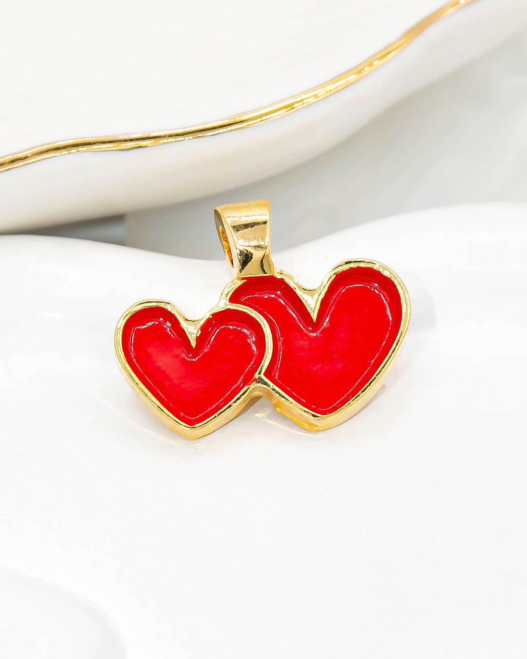 Dije corazón doble