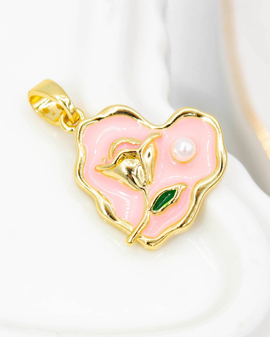 Dije corazón flor